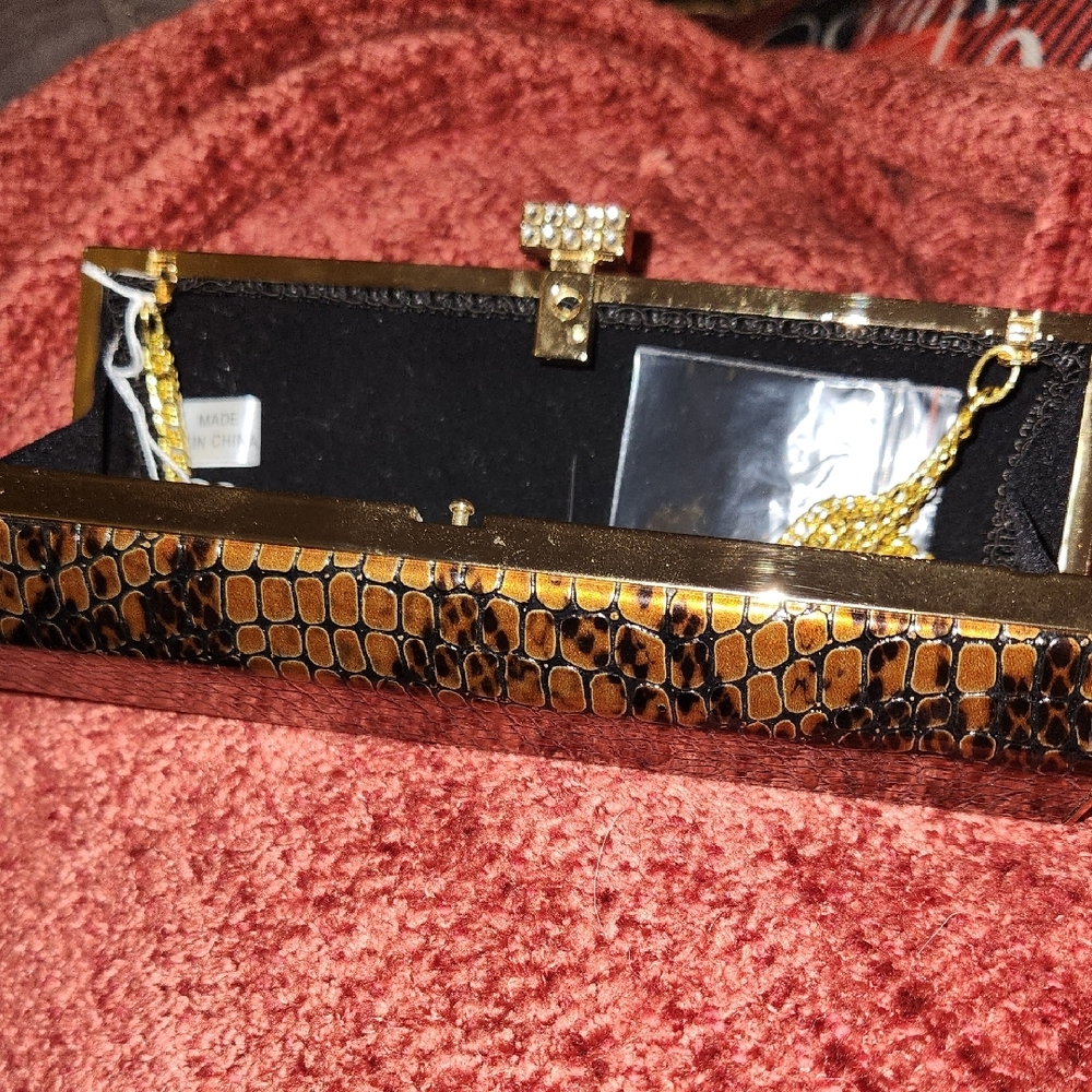 Elegant Brown Clutch with gold accents! Nice!! Snake skin design!